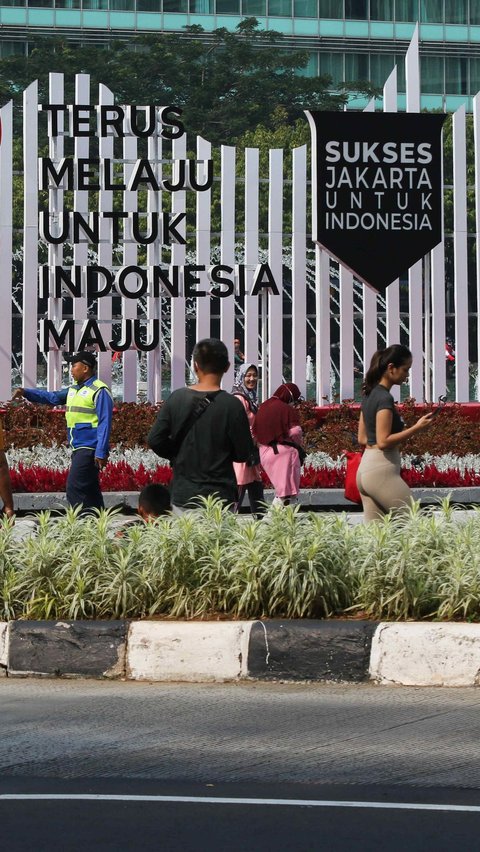 FOTO: Meski CFD Ditiadakan untuk KTT ASEAN , Warga Tetap Asyik Olahraga di Kawasan Sudirman-Thamrin