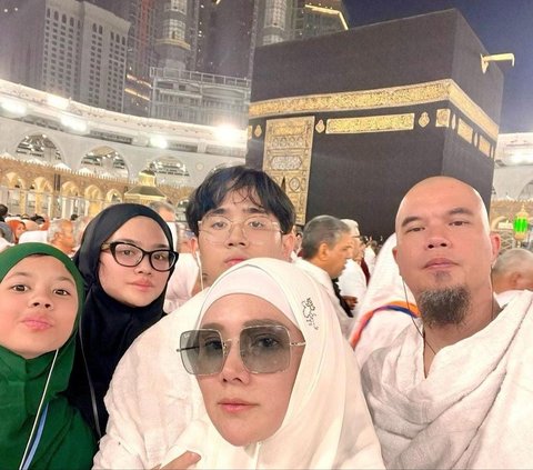 Momen Ahmad Dhani Cium Bibir Mulan Jameela, Tulis Status Romantis