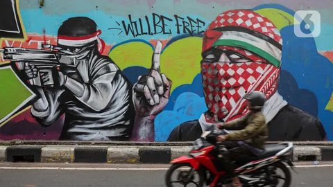 FOTO: Mural Solidaritas untuk Palestina Bermunculan di Kawasan Dukuh Atas, Wajah Benjamin Netanyahu Dibidik