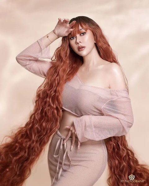 Ibu satu anak ini tampil cantik dengan cosplay jadi salah satu Disney Princess, Rapunzel. [@fdphotography90]
