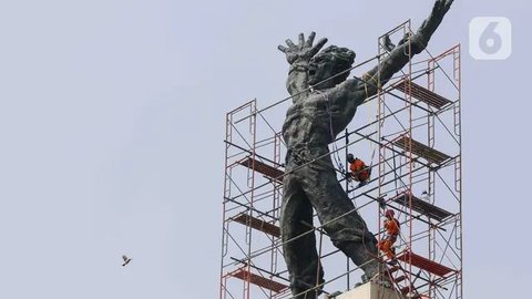 FOTO: Menengok Proses Konservasi Monumen Pembebasan Irian Barat