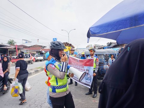 Sambil Gowes 10 Km, Polisi Rohil Sosialisasi Pemilu