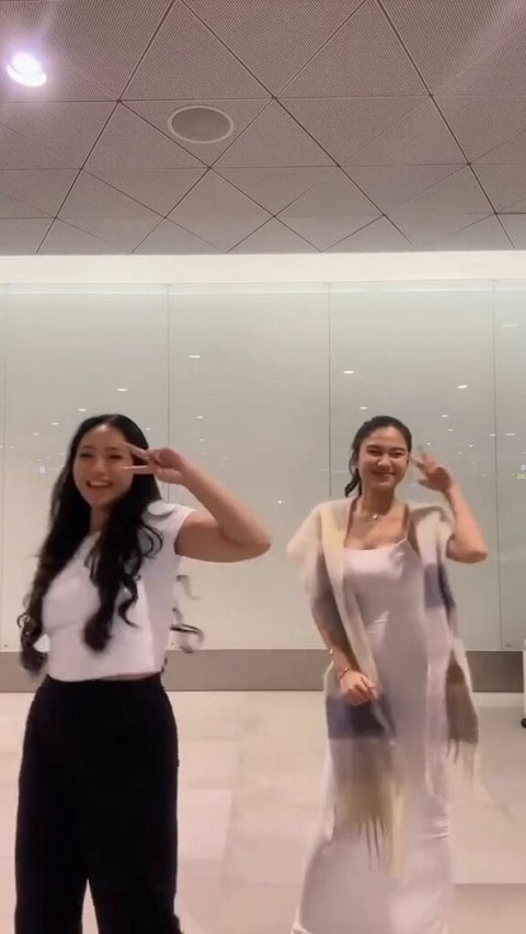 Showing off body goals, Zize dances TikTok with her friend.