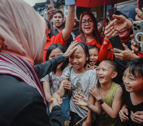 Atikoh Joins the People of Manado in the Rain: I Must Feel What the Community Feels