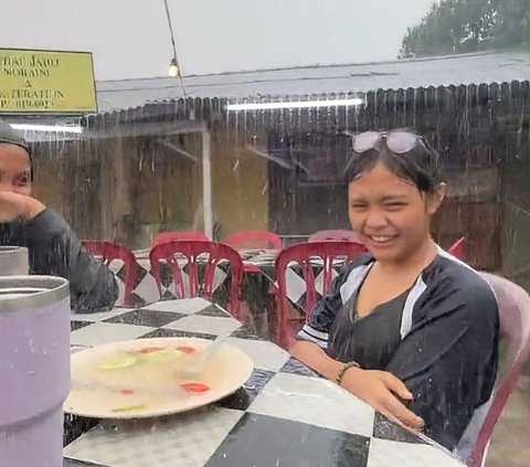 Make a game of who stands up first and treats, this gang stays wet even though it rains while hanging out in an open cafe