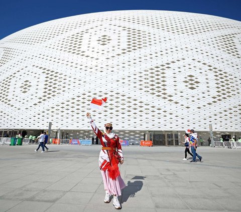 FOTO: Antusiasme Suporter Garuda Jelang Duel Timnas Indonesia vs Jepang di Piala Asia 2023