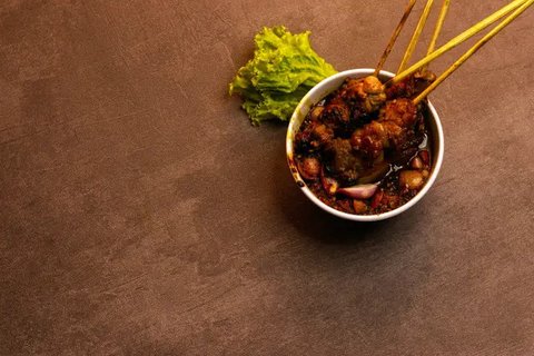 Ilustrasi Sate (Photo by Nita Anggraeni Goenawan on Unsplash)