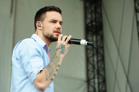 Liam Payne tampaknya tak terlalu peduli dengan kabar dirinya yang baru putus dari Cheryl Cole. (AP Photo)