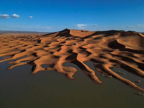 FOTO: Penampakan Gurun Sahara Dilanda Banjir Langka, Padang Pasir Tandus Berubah Jadi Danau