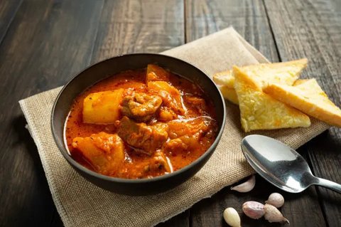 Ilustrasi Gulai Kepala Ikan. Photo by Jcomp on Freepik