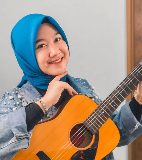 Sosok Arindi Putry Konawe, Persit yang Jadi Sorotan Usai Main Organ Piano Remix di HUT TNI-79