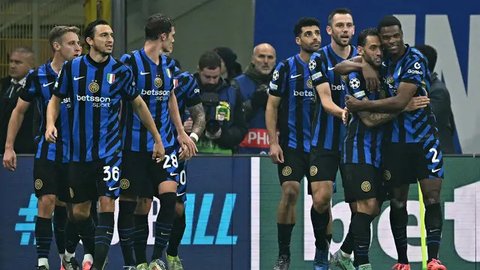 Inter Milan sukses menundukkan Arsenal dengan skor 1-0. (Gabriel BOUYS/AFP)