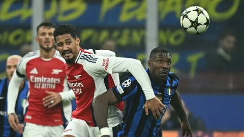 Arsenal dibuat kewalahan menembus barisan belakang Inter Milan. (Gabriel BOUYS/AFP)