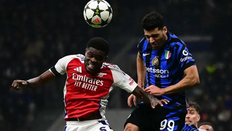 Hingga peluit panjang dibunyikan, skor 1-0 untuk keunggulan Inter Milan tidak berubah. (Marco BERTORELLO/AFP)