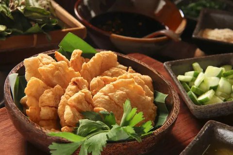 ilustrasi pempek lenjer/copyright By Meddy Gunawan (Shutterstock)