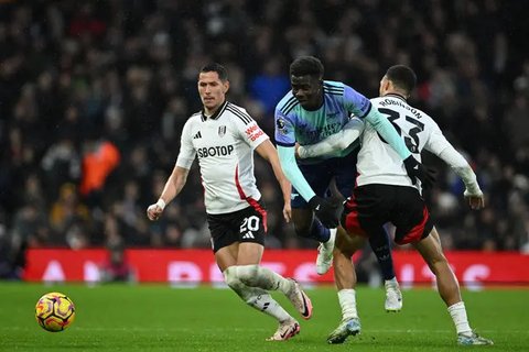 Pemain Chelsea, Cole Palmer saat mencetak gol ke gawang Tottenham Hotspur di Liga Inggris 2024/2025. (Ben STANSALL / AFP)