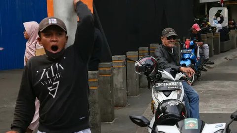Sebelumnya, pengemudi ojek pangkalan mempertanyakan apakah mereka akan mendapatkan perlakuan yang sama seperti pengemudi ojek online atau daring. (Liputan6.com/Angga Yuniar)