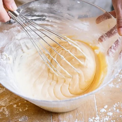 illustrasi nastar mini dalam toples copyright/ai generated