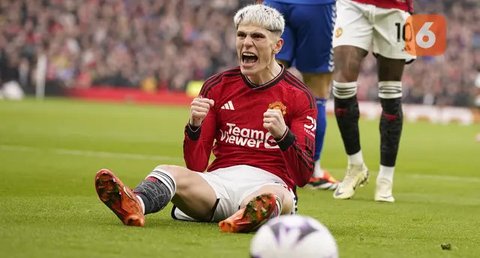 Di menit pertama, Alejandro Garnacho langsung membuka keunggulan Manchester United atas Bodo/Glimt. (Oli SCARFF/AFP)