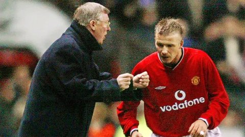 David Beckham dan Alex Ferguson (PATRICK HERTZOG / AFP)