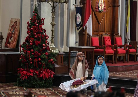 FOTO: Keceriaan Anak-Anak Ikuti Misa Natal di Gereja Katedral Jakarta, Diwarnai Operet Kelahiran Yesus