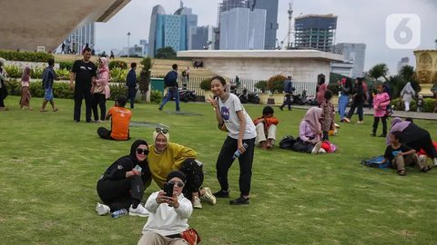 Mengutip salah satu unggahan di akun Instagram resmi monas, @monumen.nasional, disebutkan bahwa Monas akan beroperasi dari pagi hingga malam hari. (Liputan6.com/Angga Yuniar)