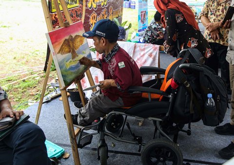 FOTO: Hari Disabilitas Internasional, Penyandang Difabel Pamerkan Kreasi dan Bakat di Taman Ismail Marzuki