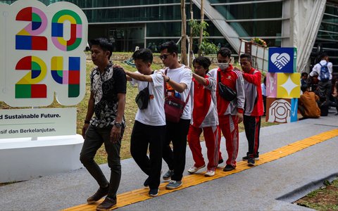 FOTO: Hari Disabilitas Internasional, Penyandang Difabel Pamerkan Kreasi dan Bakat di Taman Ismail Marzuki