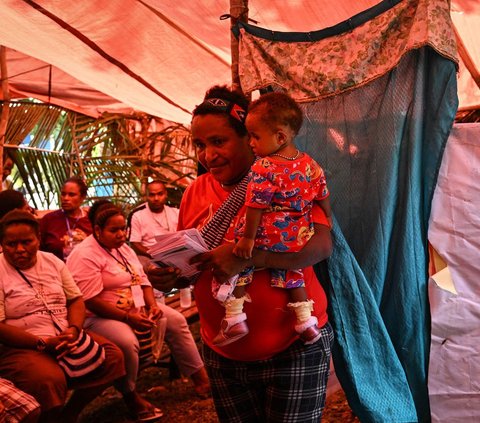 FOTO: Antusiasme Mama-Mama Papua Gunakan Hak Pilih di Pemilu 2024