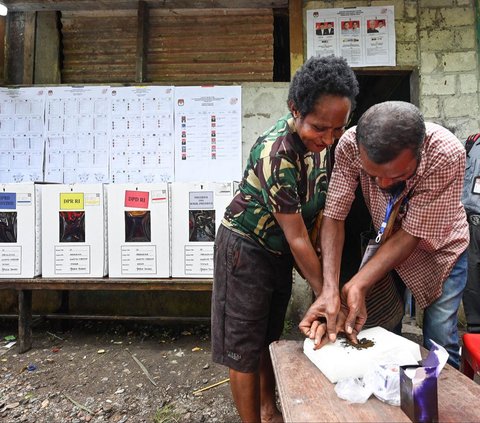 FOTO: Antusiasme Mama-Mama Papua Gunakan Hak Pilih di Pemilu 2024