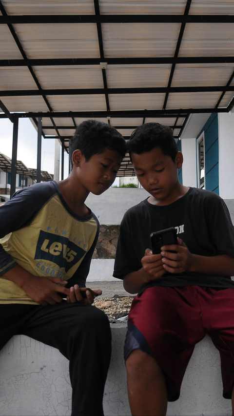 Platform pembayaran digital Gopay menjadi literasi anak muda untuk melek keuangan. Foto: merdeka.com / Imam Buhori