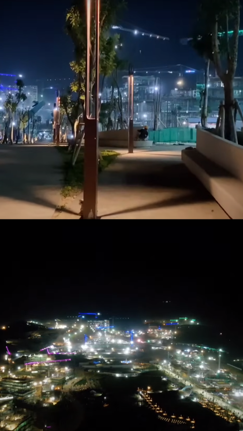 Si pria memperlihatkan suasana ikn di malam hari yang begitu indah dengan banyak pepohonan dan lampu-lampu yang bersinar terang di sekitarnya.
