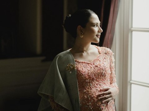 Portrait of Jessica Mila's Maternity Shoot in a Sheer Dress