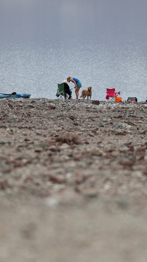 Untuk diketahui, Badai Hilary adalah badai tropis pertama yang memasuki California sejak badai Nora pada tahun 1997 dan menyebabkan kerusakan di Death Valley. Foto: REUTERS / Ronda Churchill<br>