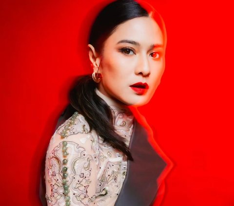 Portrait of Dian Sastro's Fierce Makeup with Bold Red Lipstick