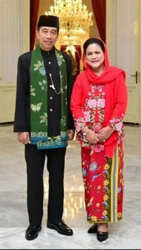 Iriana Jokowi looks stunning in encim kebaya, red cloth, and headscarf.