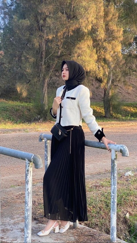 Look 3: Monochrome Elegance with Pleated Skirt