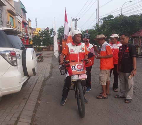 Bersepeda dari Yogyakarta, Pasutri Ini Ajak Masyarakat Hadiri Kampanye Akbar AMIN di JIS