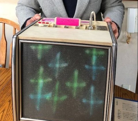 This is the figure of the original inventor of the Karaoke machine who passed away at the age of 100