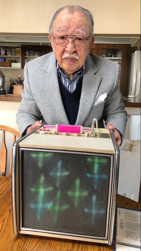 This is the figure of the original inventor of the Karaoke machine who passed away at the age of 100