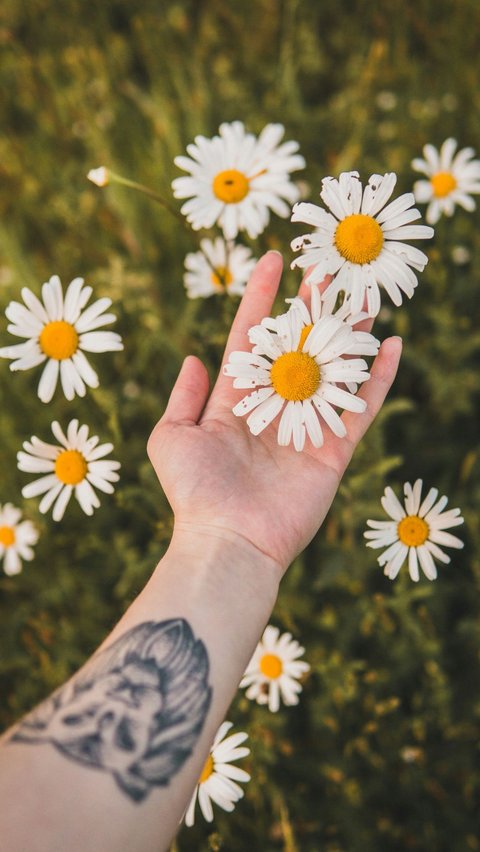 Tattoo of Flower as a Symbol of Femininity