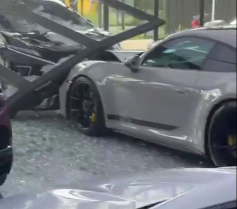 Belum Ada Kesepakatan Damai, Kasus Pengemudi Xpander Tabrak Porsche di Showroom Mewah PIK Masih Berlanjut