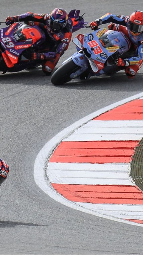 Duel tersebut akhirnya, dimenangkan Marquez yang sukses meraih podium kedua, di bawah Maverick Vinales yang berhasil finis terdepan di MotoGP Portugal 2024. AFP Photo<br>