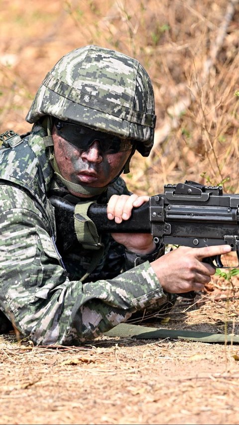 Latihan ini melibatkan lebih dari 7.000 serdadu dan prajurit militer dari 30 negara. Manan Vatsyayana/AFP