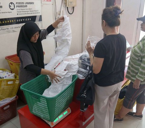 FOTO: Berkah Lebaran, Permintaan Layanan Laundry Melonjak 2 Kali Lipat