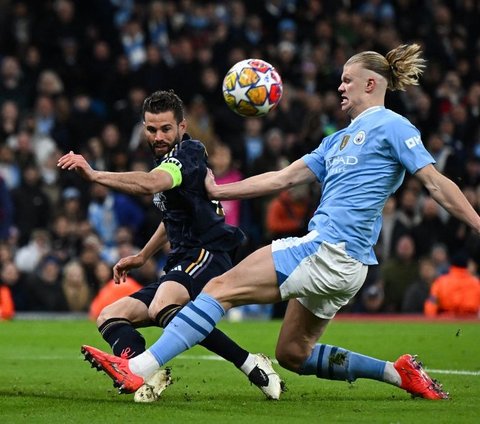 FOTO: Momen Real Madrid Benamkan Manchester City Lewat Drama Adu Penalti di Perempat Final Liga Champions