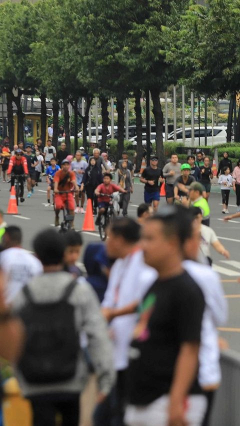 Pemberlakuan HBKB kembali ini telah disambut antusias oleh warga. Mereka gembira dapat berolahraga di jalan protokol Jakarta tersebut. Foto: Liputan6.com / Herman Zakharia