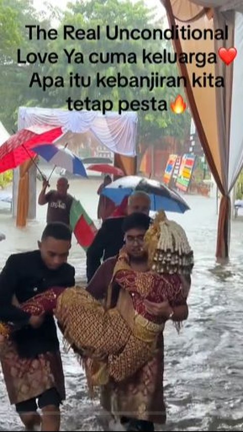 Unconditional Love Moment When Wedding Reception Venue Flooded, Family Carries the Bride and Groom Together