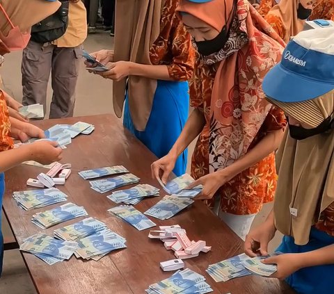 Viral! Daily and Contract Workers Counting Lebaran THR Money Worth Rp129 Billion, Revealing Their Income