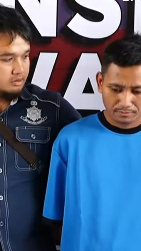 The police officer's expression beside Pegi during the press conference becomes the spotlight.